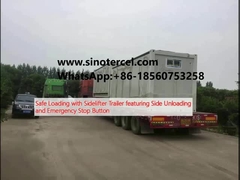 Pemuatan aman dengan trailer sidelifter dengan side unloading dan tombol emergency stop